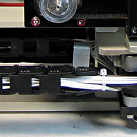 Professional repaired cable break of an ABI 3100 autosampler. There is no need to exchange complete and expensive instrument groups, if the repair of a single components results in technically equal solution.